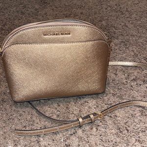 Rose gold Michael kors purse